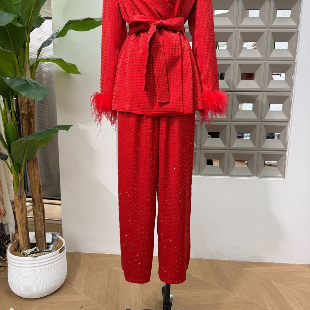 Red Bedazzled trousers with matching red Bedazzled  jacket.