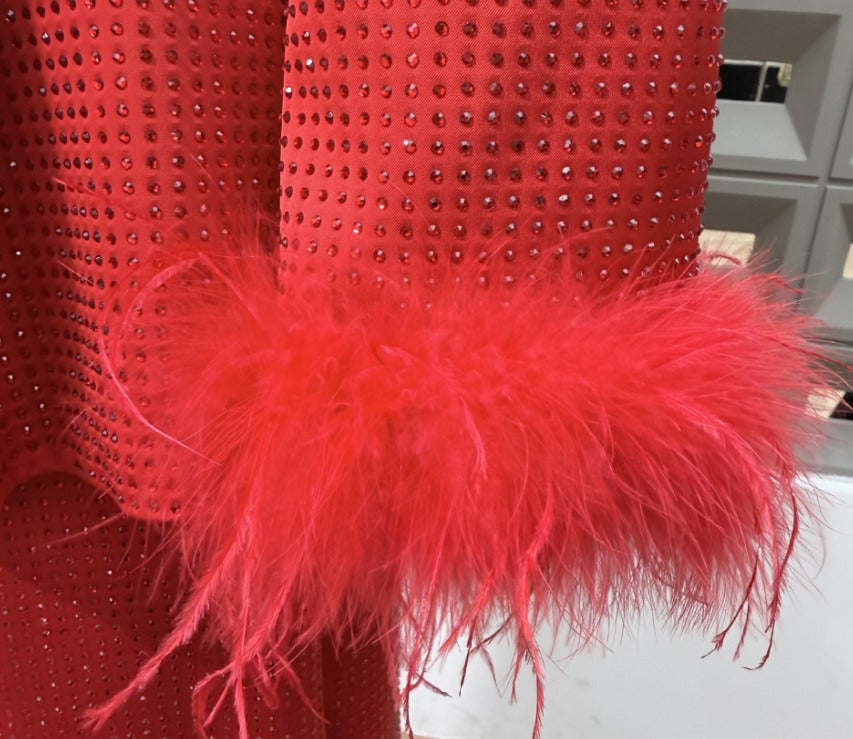 Red Bedazzled trousers with matching red Bedazzled  jacket.