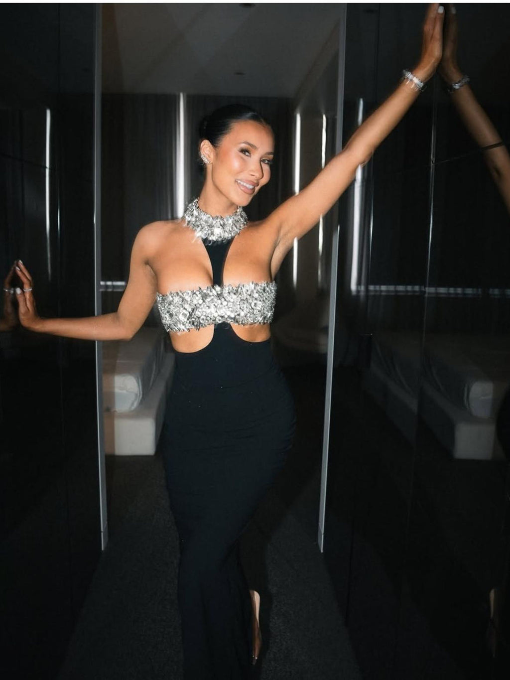 Long black dress with rhinestones and a bare back