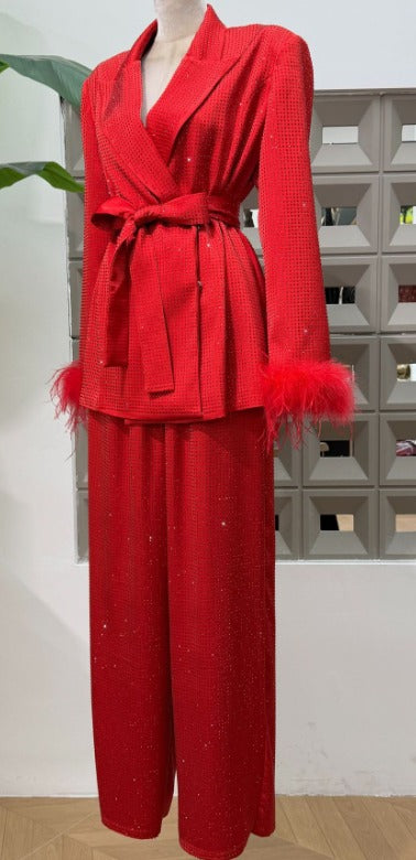 Red Bedazzled trousers with matching red Bedazzled  jacket.