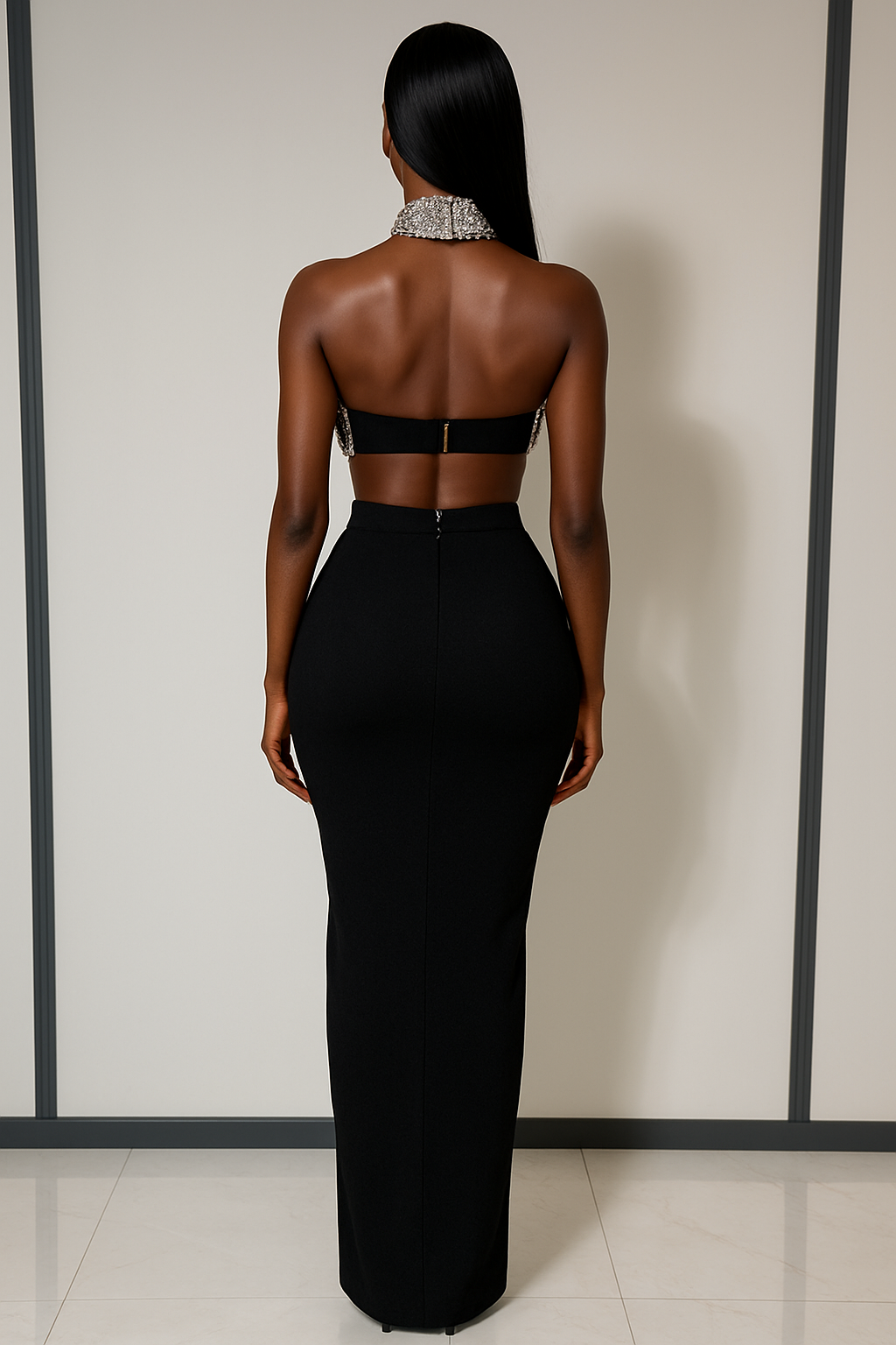 Long black dress with rhinestones and a bare back