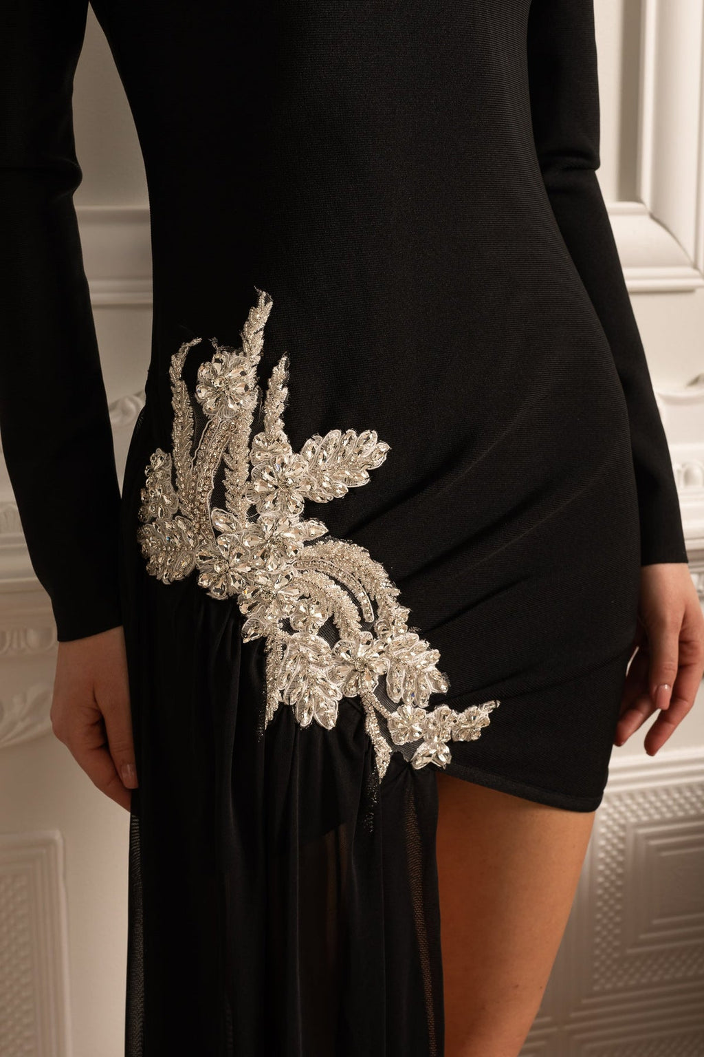 ASYMMETRICAL FITTED DRESS WITH WHITE HIP EMBELLISHMENTS AND SHEER FLOOR-LENGTH EXTENSION - BLACK