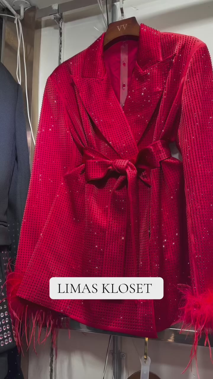 Red Bedazzled trousers with matching red Bedazzled  jacket.